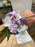 Orchid wrist corsage with accent flowers